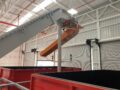 Discharge channel of a briquetting press