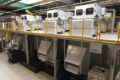 Vier FAUDI Druckbandfilter nebeneinander in Produktionshalle