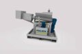 FAUDI screw press grey background for the reduction of production waste/sludge