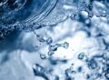 Water treatment: close up of water in motion, filtration of water