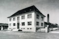 Schwarz-Weiß-Foto des alten Firmengebäudes in 1938 der Firma FAUDI