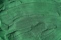 Hintergrund aus grünem Spirulina-Algenpulver- Spirulina-Algen-Filtration